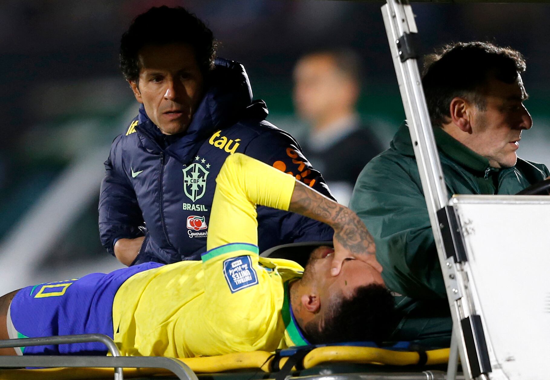 Soccer Football - World Cup - South American Qualifiers - Uruguay v Brazil - Estadio Centenario, Montevideo, Uruguay - October 17, 2023 Brazil's Neymar is brought off the pitch after sustaining an injury REUTERS/Andres Cuenca