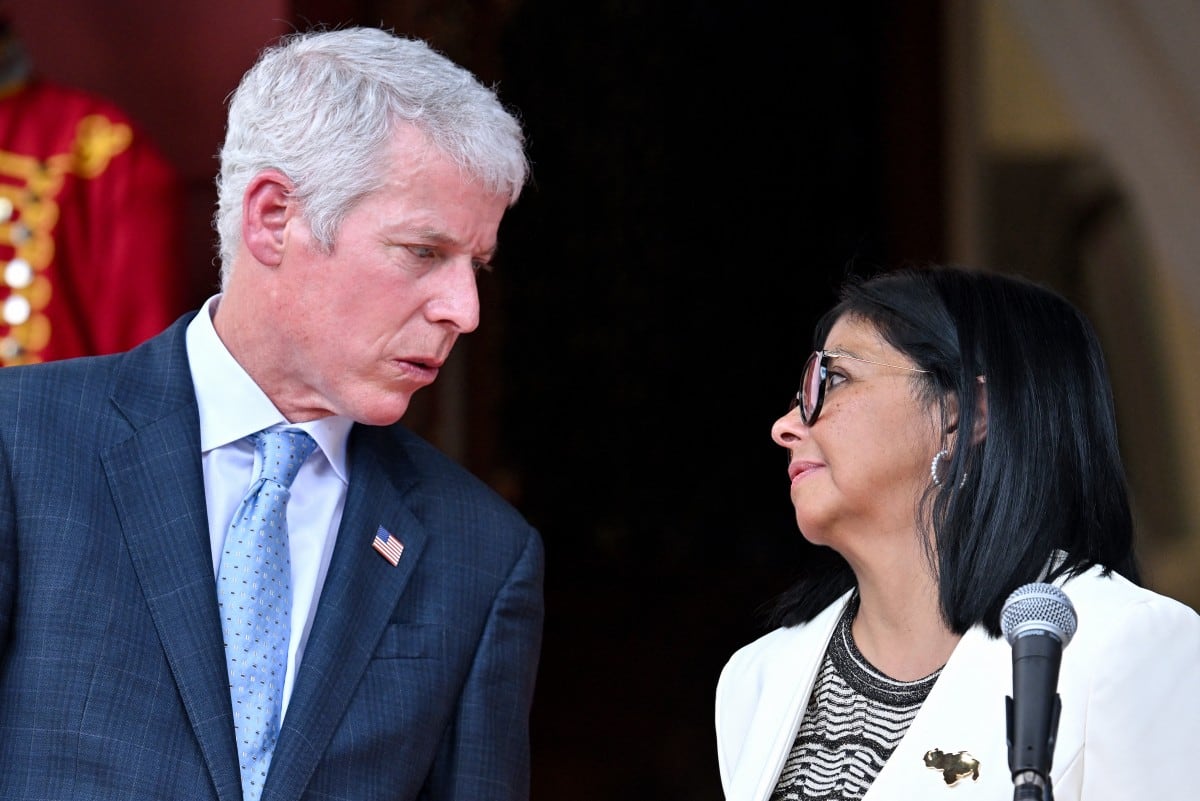 Chris Wright y Delcy Rodríguez.