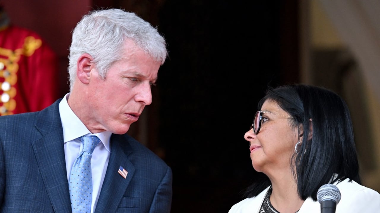 Chris Wright y Delcy Rodríguez.