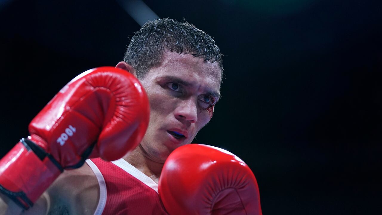 Colombia's Ceiber David Avila Segura celebrates after winning the match against Zambia's Everisto Mulenga exchange during the men's featherweight 57-kg preliminaries boxing match at the 2020 Summer Olympics, Wednesday, July 28, 2021, in Tokyo, Japan. (AP Photo/Frank Franklin II, Pool)