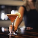 Woman serving martini
