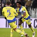 Juventus' Juan Cuadrado, right, celebrates after scoring during the Italian Cup, round of 16 soccer match between Juventus and Sampdoria, at the Allianz stadium in Turin, Italy, Tuesday, Jan. 18, 2022. (Marco Alpozzi/LaPresse via AP)