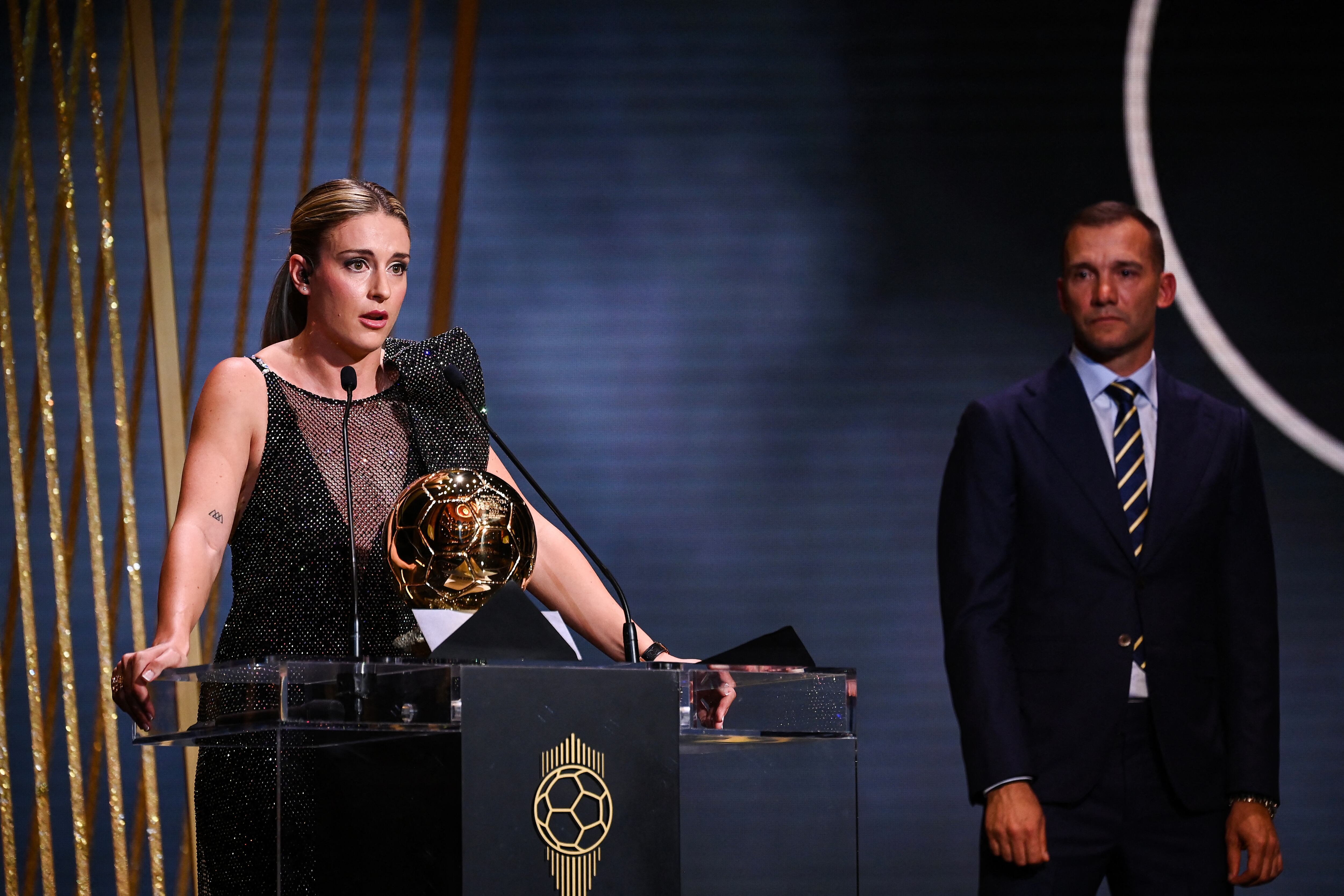 FC Barcelona's Spanish midfielder Alexia Putellas receives her second Woman Ballon d'Or award from Ukrainian former football player Andriy Shevchenko the 2022 Ballon d'Or France Football award ceremony at the Theatre du Chatelet in Paris on October 17, 2022. (Photo by FRANCK FIFE / AFP)