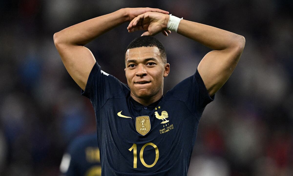 Soccer Football - FIFA World Cup Qatar 2022 - Round of 16 - France v Poland - Al Thumama Stadium, Doha, Qatar - December 4, 2022 France's Kylian Mbappe celebrates scoring their third goal REUTERS/Dylan Martinez