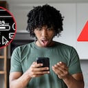 Hombre mira preocupado su celular al haber hecho mal una descarga de videojuegos.