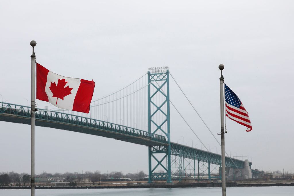 WINDSOR, CANADA - MARCH 4: Trucks cross the Ambassador Bridge between Windsor, Canada and Detroit, Michigan on the first day of President Donald Trump's new 25% tariffs on goods from Canada and Mexico on March 4, 2025 in Windsor, Canada. President Trump is also adding another 10% tariff on imports from China, bringing the tariffs on that country's goods to 20%. (Photo by Bill Pugliano/Getty Images)