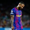 Barcelona's Memphis Depay reacts at the end of a Champions League group E soccer match between F.C. Barcelona and Bayern at Camp Nou stadium in Barcelona, Spain, Tuesday, Sept. 14, 2021. (AP Photo/Joan Monfort)