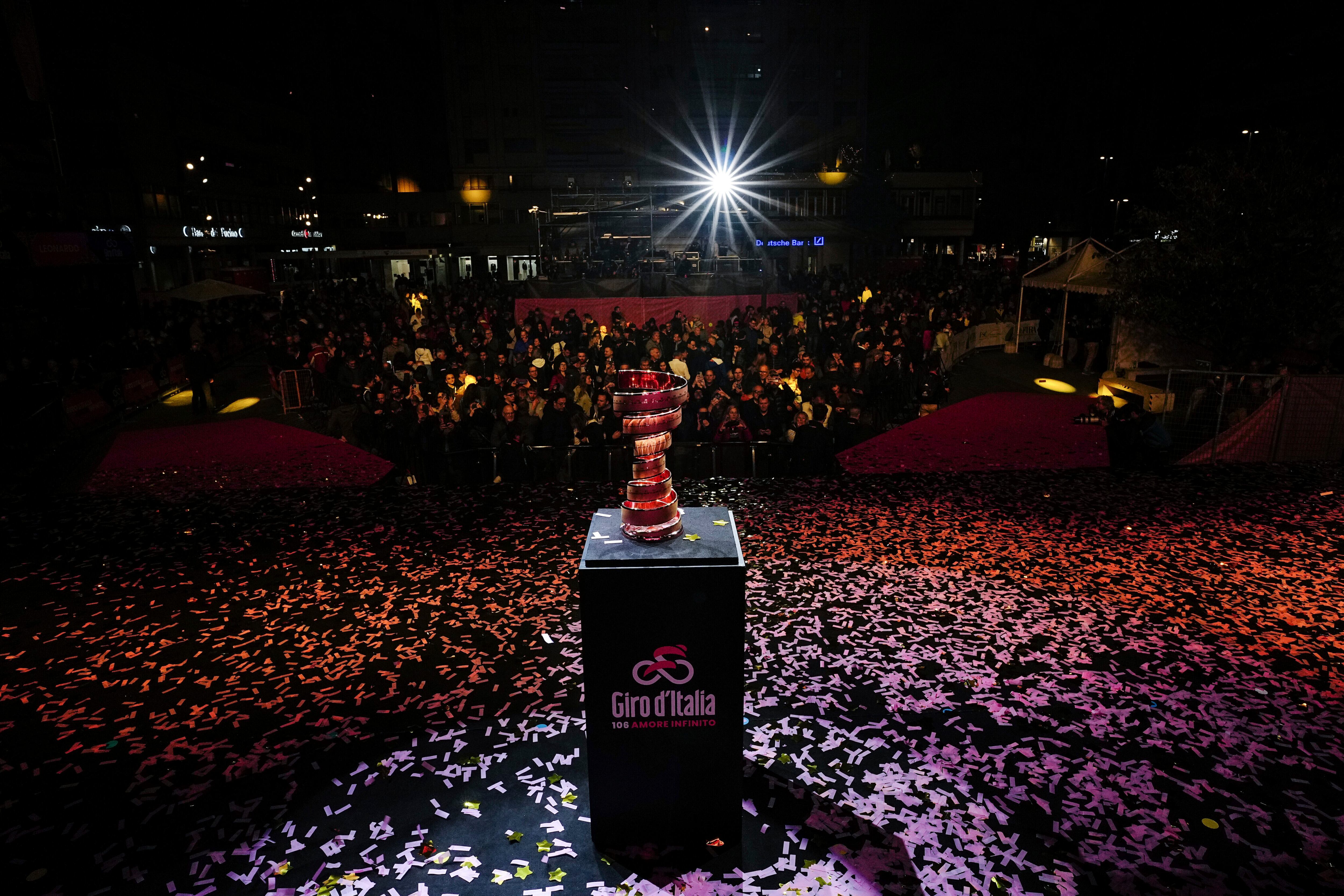 The trophy is illuminated during the team presentation of Giro d'Italia 2023 at Piazza Salotto, in Pescara, Italy, Thursday, May 4, 2023. (Marco Alpozzi/LaPresse via AP)