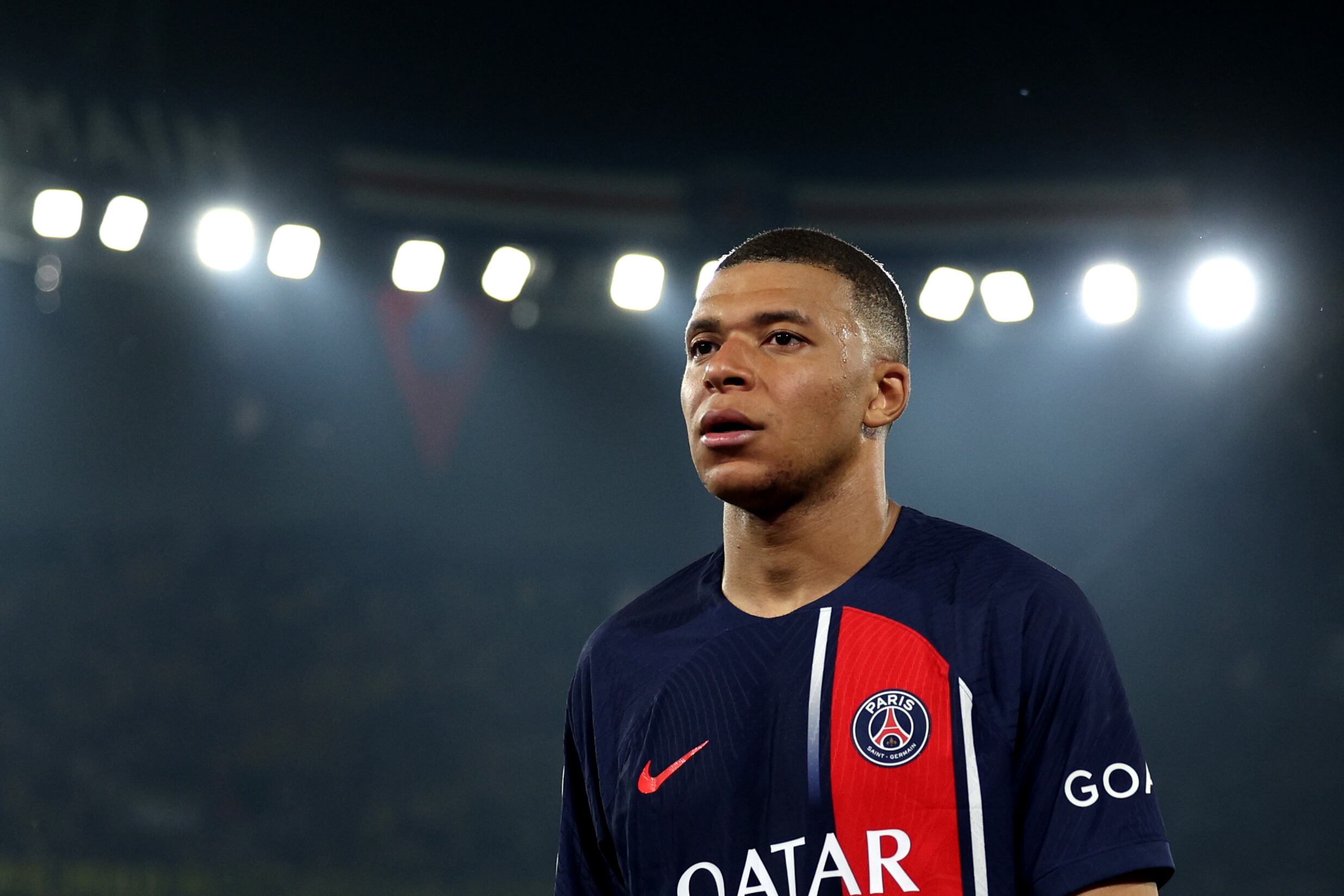 PARIS, FRANCE - MAY 07: Kylian Mbappe of Paris Saint-Germain looks dejected as he leaves the field after defeat to Borussia Dortmund during the UEFA Champions League semi-final second leg match between Paris Saint-Germain and Borussia Dortmund at Parc des Princes on May 07, 2024 in Paris, France. (Photo by Richard Heathcote/Getty Images)