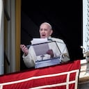 Pope Francis speaks from a window of the apostolic palace overlooking St. Peter's Square in the Vatican during the weekly Angelus prayer followed by the recitation of the Regina Coeli on May 09, 2021. (Photo by Vincenzo PINTO / AFP)
