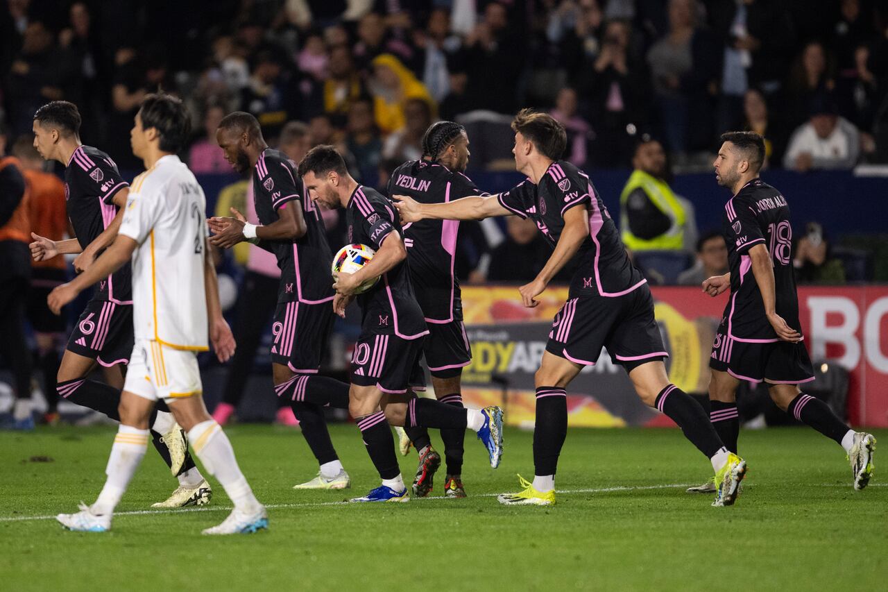 Inter Miami players celebrate a goal by forward Lionel Messi (10) during the second half of an MLS soccer match against the Los Angeles Galaxy, Sunday, Feb. 25, 2024, in Carson, Calif. (AP Photo/Kyusung Gong)