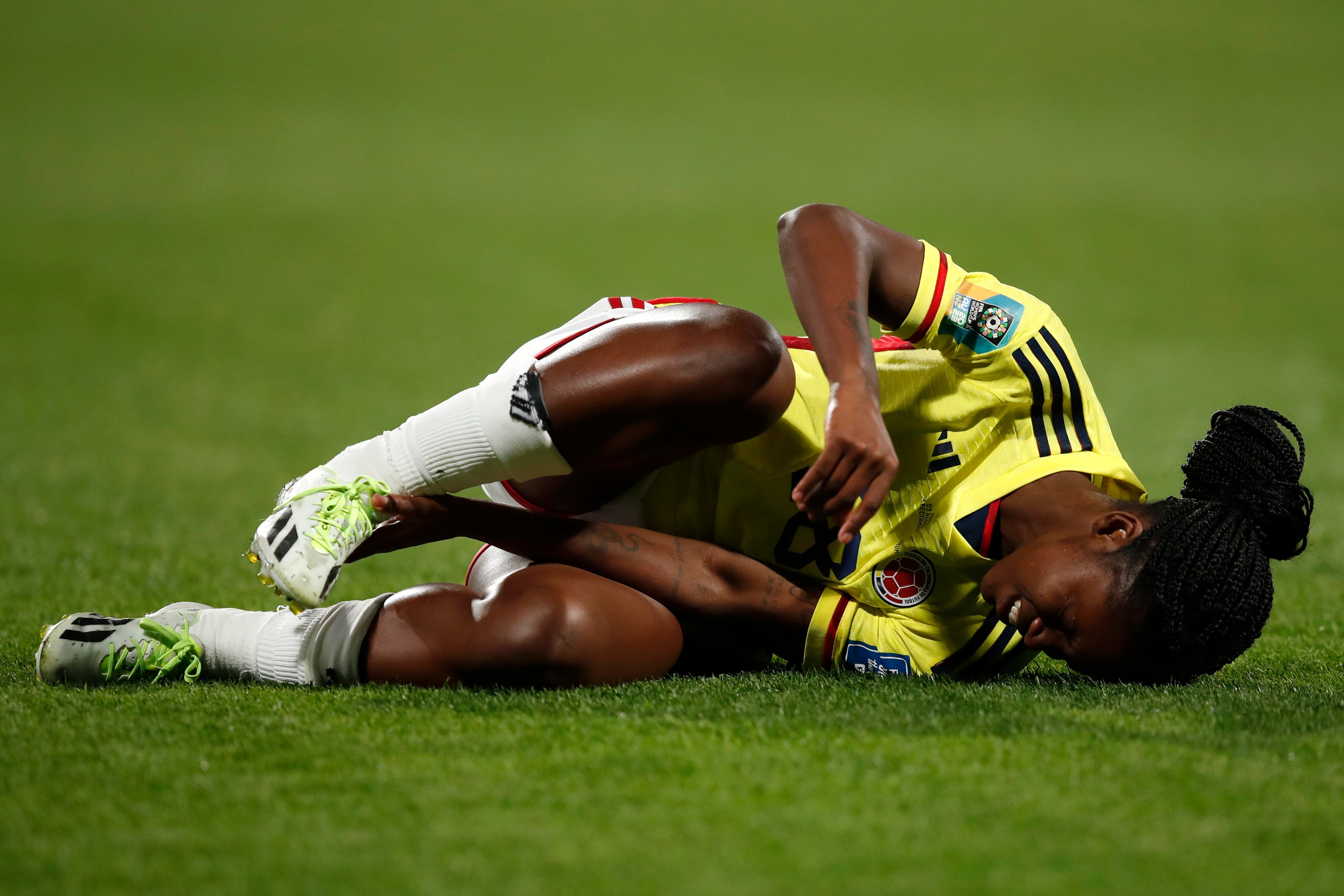 Colombia's Linda Caicedo holds her foot during the Women's World Cup Group H soccer match between Morocco and Colombia in Perth, Australia, Thursday, Aug. 3, 2023. (AP Photo/Gary Day)
