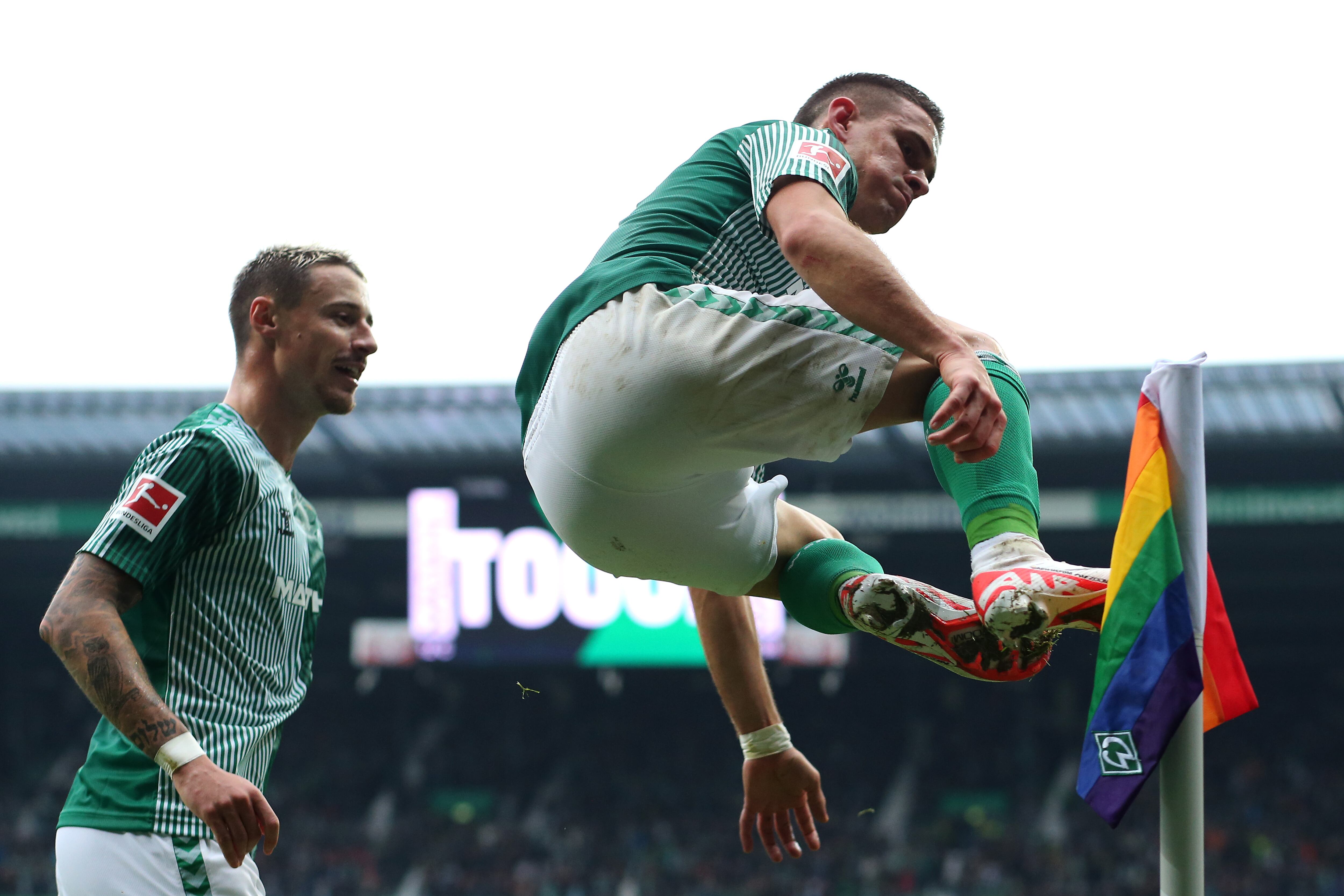 BREMEN, GERMANY - OCTOBER 28: Rafael Santos Borre Maury of Werder Bremen celebrates his teams first goal (OG by Robin Knoche, not in frame) with teammate Marco Friedl during the Bundesliga match between SV Werder Bremen and 1. FC Union Berlin at Wohninvest Weserstadion on October 28, 2023 in Bremen, Germany. (Photo by Cathrin Mueller/Getty Images)