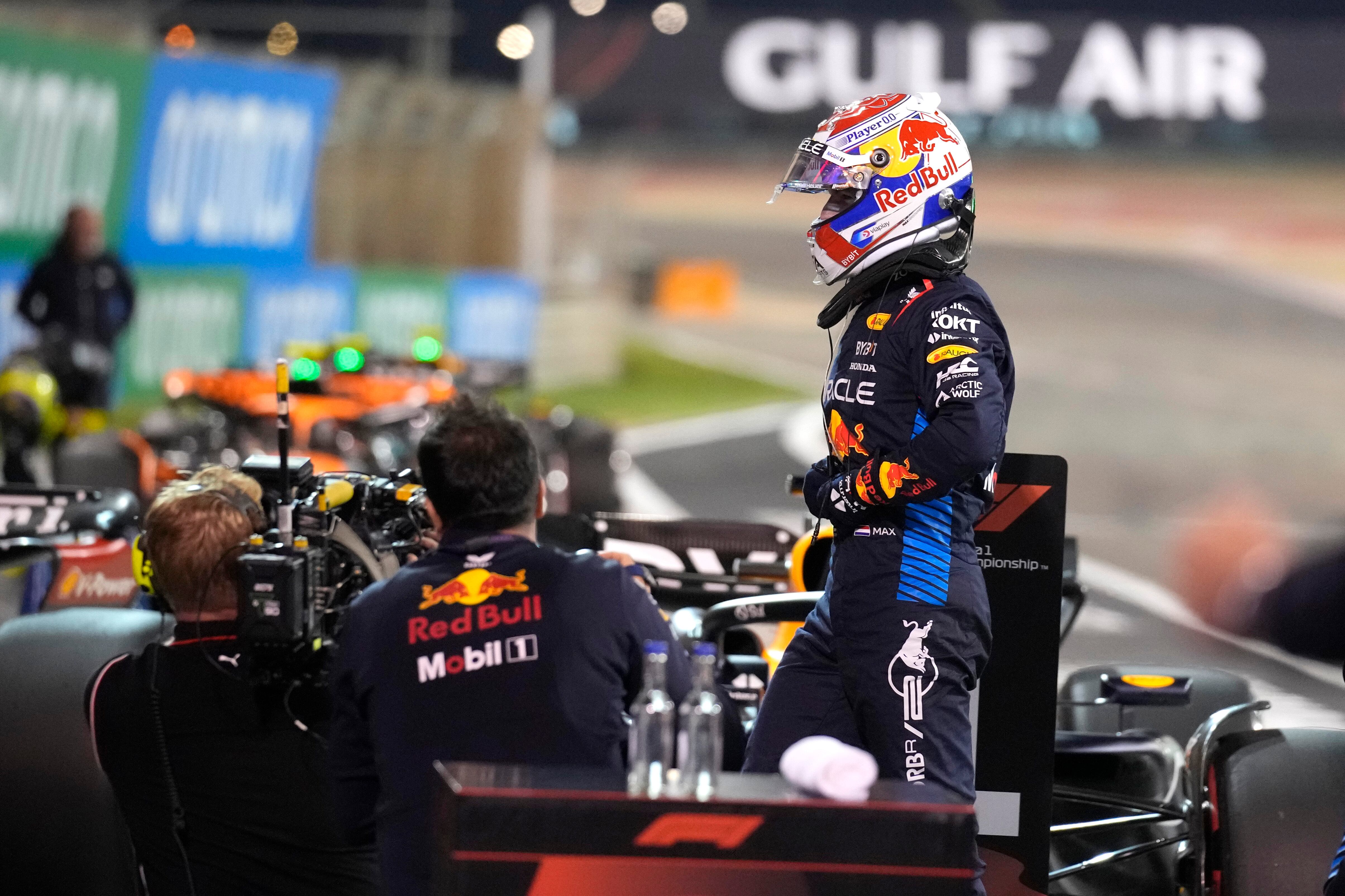 Red Bull driver Max Verstappen of the Netherlands gets out of his car after he clocked the fastest time during qualification ahead of the Formula One Bahrain Grand Prix at the Bahrain International Circuit in Sakhir, Bahrain, Friday, March 1, 2024. (AP Photo/Darko Bandic)