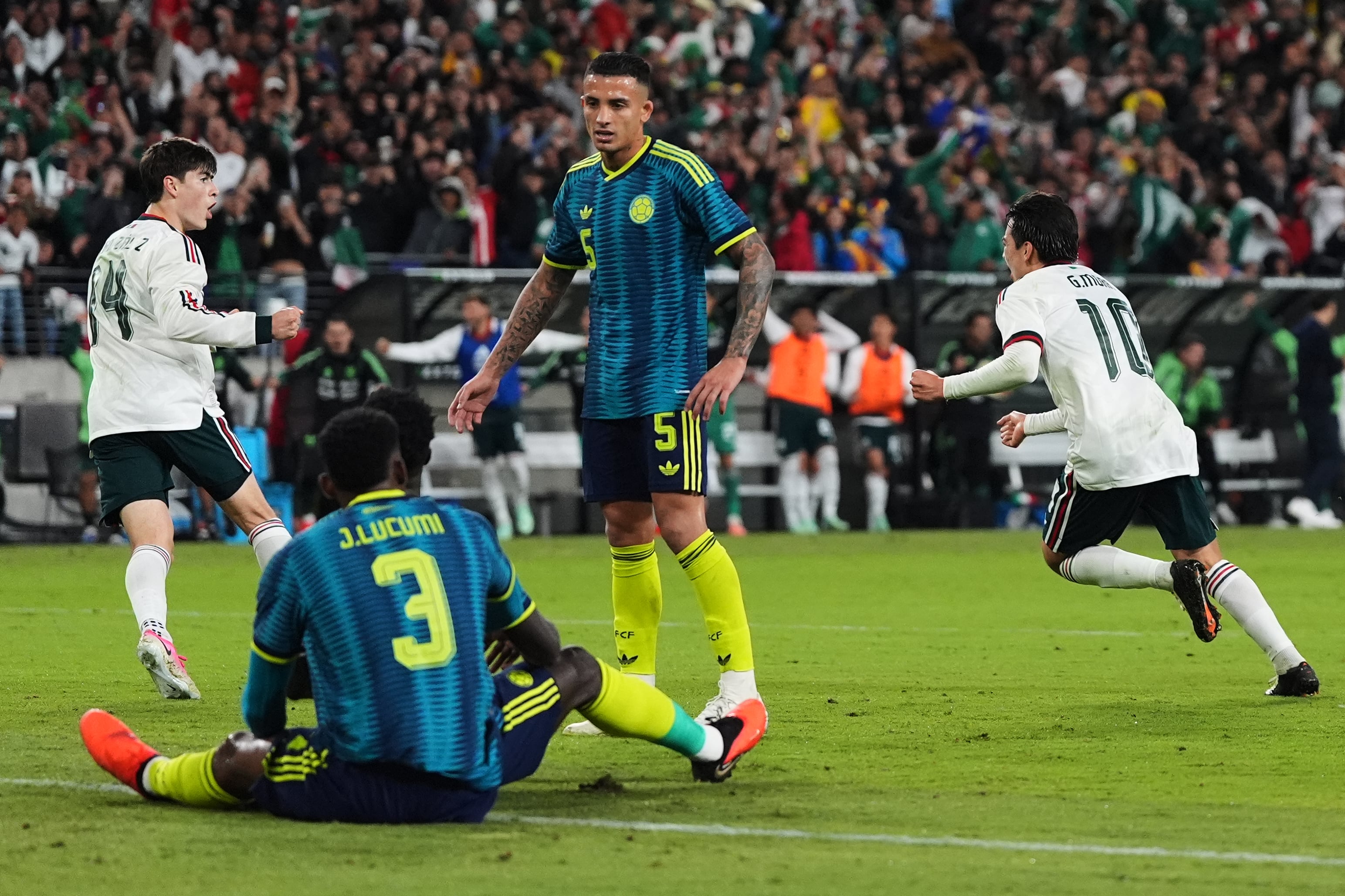 Mexico's Gilberto Mora (10) celebrates after scoring his side's opening goal during the second half of an international friendly soccer match against Colombia, Saturday, Sept. 26, 2026, in Baltimore. (AP Photo/Stephanie Scarbrough)