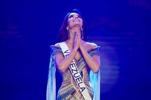 Miss Venezuela Amanda Dudamel reacts after being selected as one of the final three contestants in the final round of the 71st Miss Universe Beauty Pageant in New Orleans, Saturday, Jan. 14, 2023. (AP Photo/Gerald Herbert)