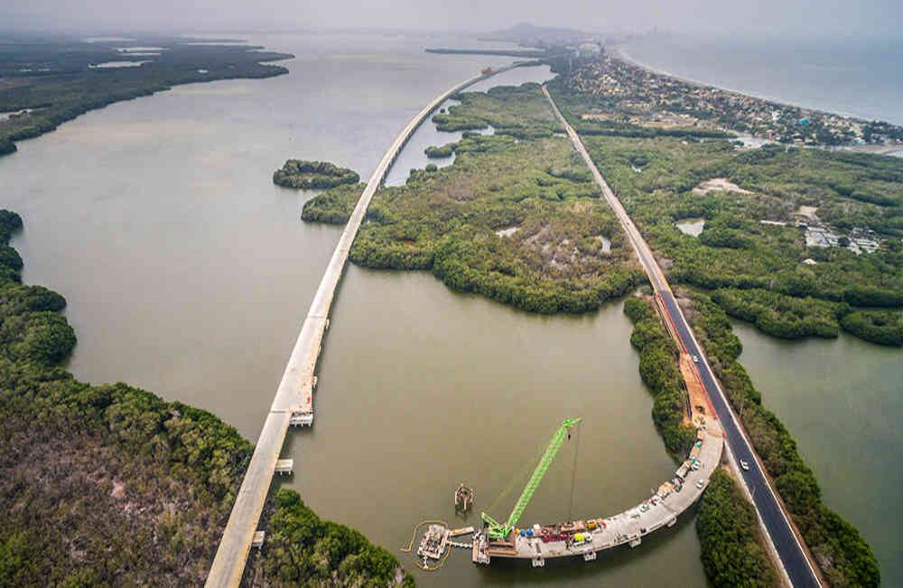 Ciénaga de la Virgen. En construcción: un viaducto de 4,73 kilómetros, del cual el 87 por ciento se ubica sobre la Ciénaga de Magdalena. Este se proyecta como el más grande de Colombia y el tercero de América Latina. Inversión: 687.290 millones de pesos. Beneficio: conecta al Caribe colombiano, específicamente a Cartagena y Barranquilla. Terminación de obra: junio de 2018.