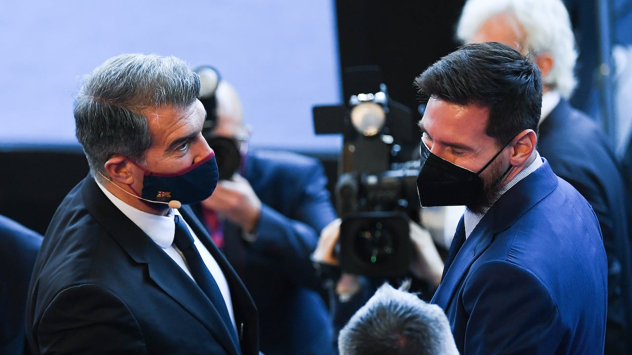 Joan Laporta y Lionel Messi durante un evento en el Camp Nou