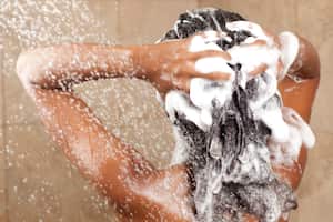 "Woman washing her hair with shampoo, rear view.Similar images preview:"