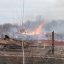 Flame and smoke rise from the debris of a privet house in the aftermath of Russian shelling outside Kyiv, Ukraine, Thursday, Feb. 24, 2022. Russia on Thursday unleashed a barrage of air and missile strikes on Ukrainian facilities across the country. (AP Photo/Efrem Lukatsky)