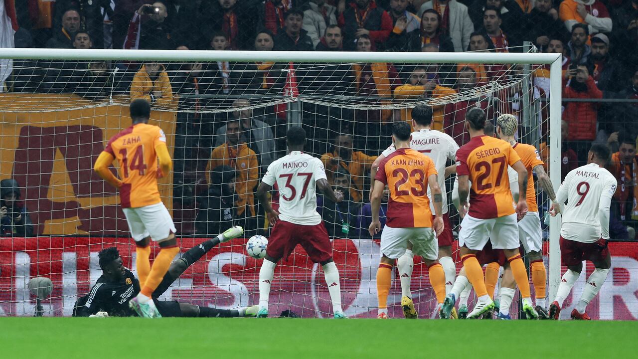 Soccer Football - Champions League - Group A - Galatasaray v Manchester United - RAMS Park, Istanbul, Turkey - November 29, 2023 Galatasaray's Hakim Ziyech scores their second goal past Manchester United's Andre Onana REUTERS/Umit Bektas