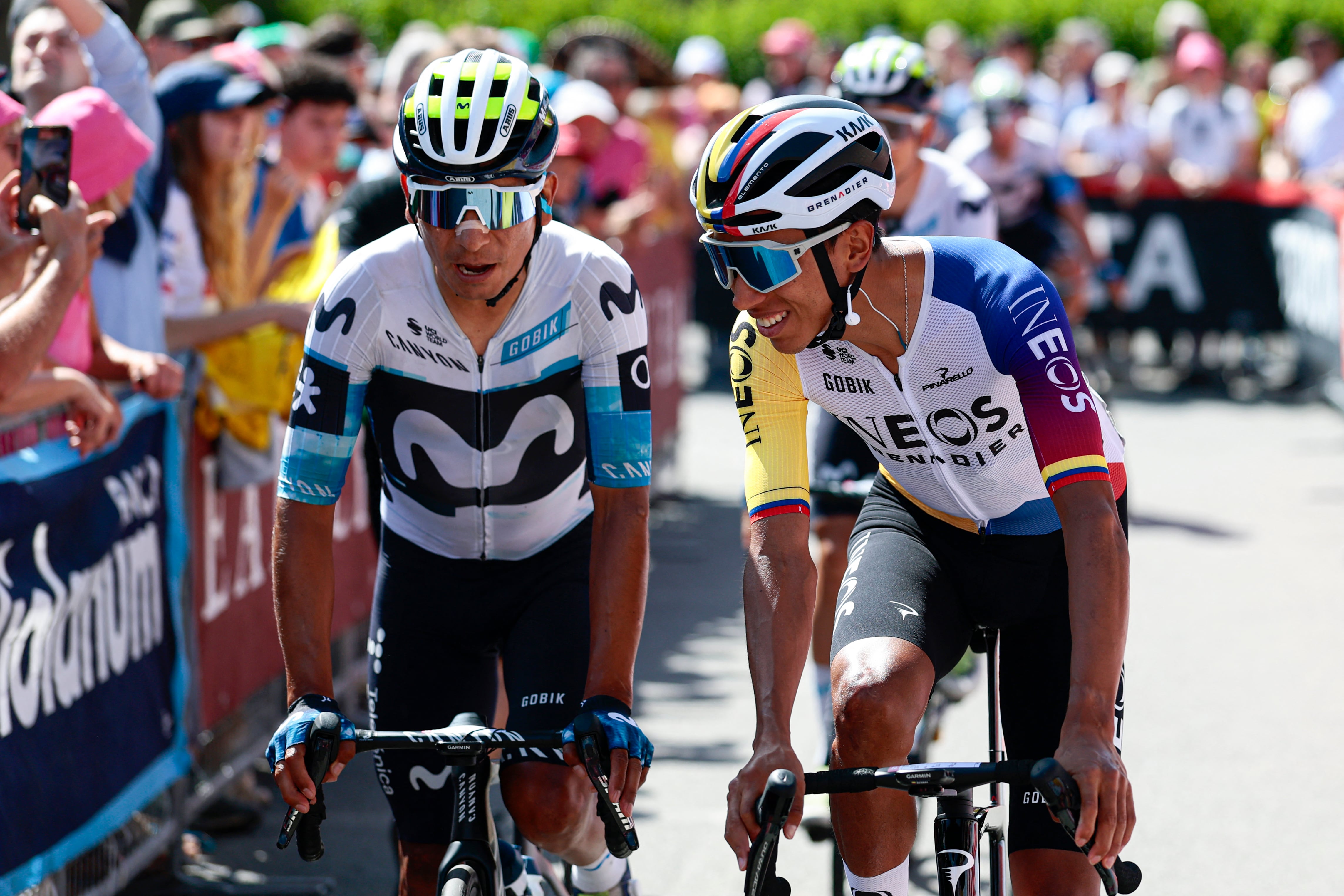 Ineos Grenadiers' Colombian rider Egan Bernal (R) and Movistar Team's Colombian rider Nairo Quintana react ahead of the start of the 20th stage of the 108th Giro d'Italia cycling race 205kms from Verres to Sestriere on May 31, 2025. (Photo by Luca Bettini / AFP)