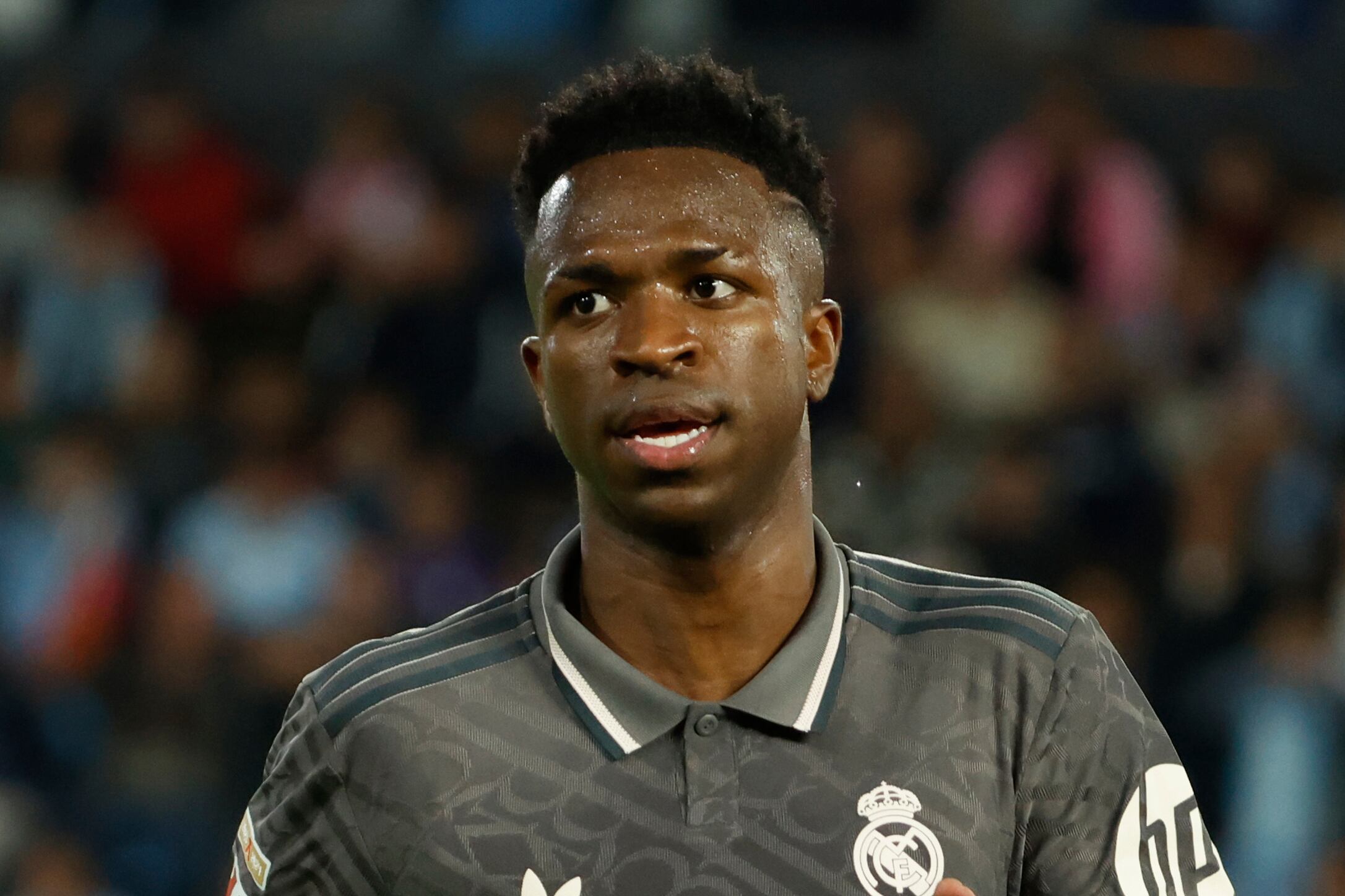 Real Madrid's Vinicius Junior reacts after scoring his side's second goal during a Spanish La Liga soccer match between Celta and Real Madrid at the Balaidos, stadium in Vigo, Spain, Saturday, Oct. 19, 2024. (AP Photo/Lalo R. Villar)