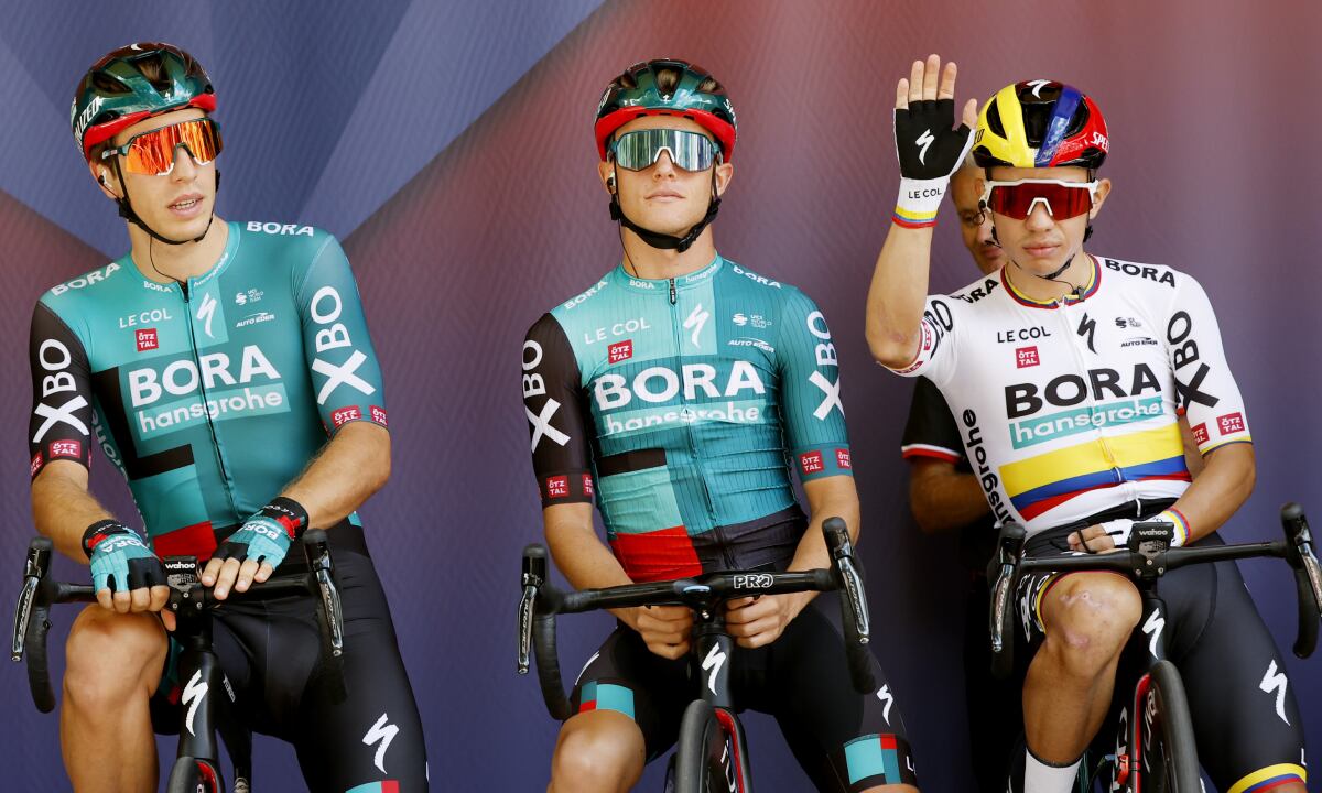 UTRECHT, NETHERLANDS - AUGUST 20: (L-R) Danny Van Poppel of Netherlands, Matteo Fabbro of Italy and Sergio Andres Higuita Garcia of Colombia and Team Bora - Hansgrohe during the team presentation prior to the 77th Tour of Spain 2022, Stage 2 a 175,1km stage from `s-Hertogenbosch to Utrecht / #LaVuelta22 / #WorldTour / on August 20, 2022 in Utrecht, Netherlands. (Photo by Getty Images/Bas Czerwinski)