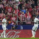 FILE - Real Madrid's Rodrygo, left, celebrates after scoring with his teammate Real Madrid's Vinicius Junior the opening goal during the Spanish La Liga soccer match between Atletico Madrid and Real Madrid at the Wanda Metropolitano stadium in Madrid, Spain, Sept. 18, 2022. With a goal and a dance, Real Madrid's young Brazilian forwards made a strong statement against racism in soccer this weekend. With their samba-like moves after a goal in the derby against Atletico on Sunday, Rodrygo and Vinícius Junior made it clear they are not backing down. (AP Photo/Manu Fernandez)