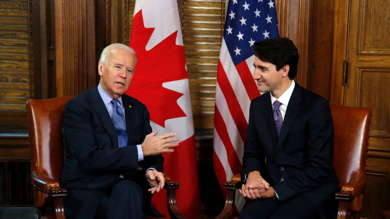 FILE - In this Dec. 9, 2016 file photo, Canadian Prime Minister Justin Trudeau meets with then U.S. Vice President Joe Biden on Parliament Hill in Ottawa. Biden will still host Canadian Prime Minister Justin Trudeau on Tuesday for the first bilateral meeting but will do it virtually. (Patrick Doyle/The Canadian Press via AP)