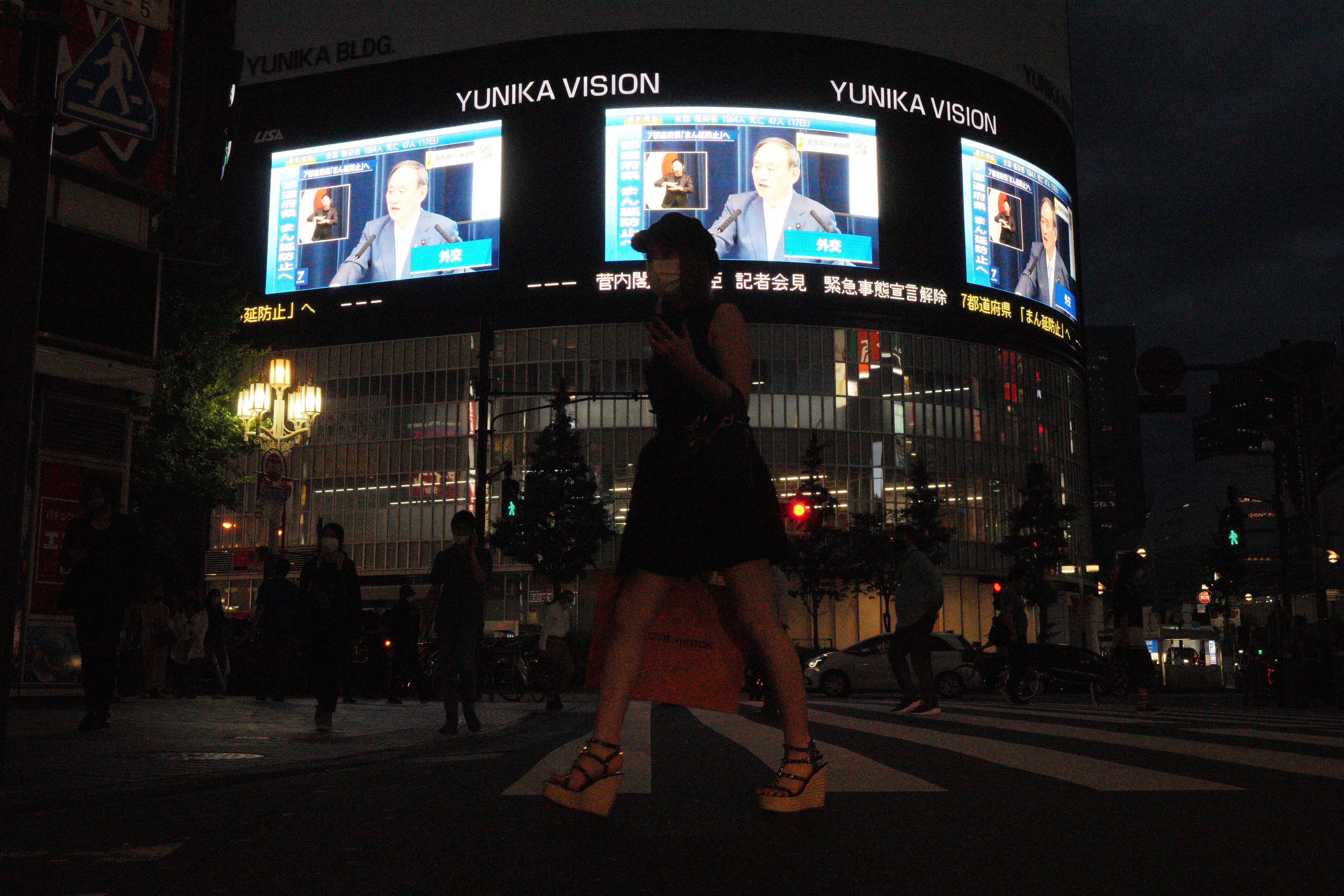 Tokio descarta eventos de pantallas gigantes para los Juegos Olímpicos. (AP Foto/Eugene Hoshiko)