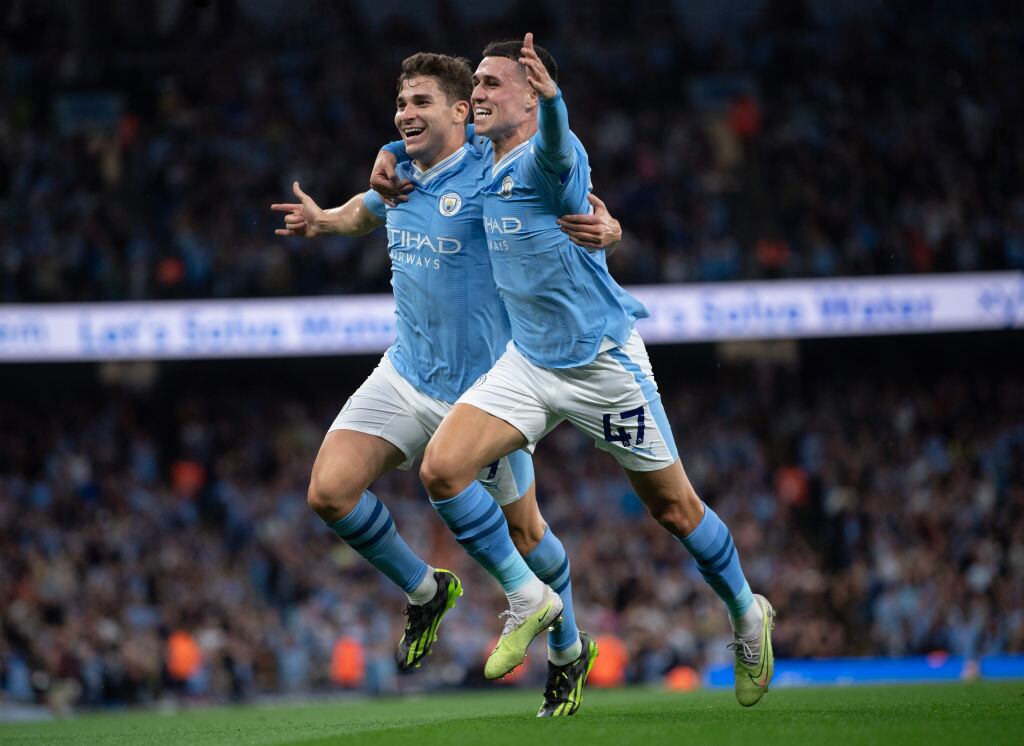 MANCHESTER, ENGLAND - AUGUST 19: Phil Foden of Manchester City celebrates with goalscorer Julian Alvarez during the Premier League match between Manchester City and Newcastle United at Etihad Stadium on August 19, 2023 in Manchester, England. (Photo by Visionhaus/Getty Images)