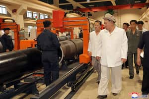 This picture taken during the period from August 3 to August 5, 2023 and released from North Korea's official Korean Central News Agency (KCNA) on August 6 shows North Korean leader Kim Jong Un visiting a major munitions factory at an undisclosed location in North Korea. (Photo by KCNA VIA KNS / AFP) / South Korea OUT / ---EDITORS NOTE---    PIXELLATION OF FACES DONE AT SOURCE      RESTRICTED TO EDITORIAL USE - MANDATORY CREDIT "AFP PHOTO/KCNA VIA KNS" - NO MARKETING NO ADVERTISING CAMPAIGNS - DISTRIBUTED AS A SERVICE TO CLIENTS / THIS PICTURE WAS MADE AVAILABLE BY A THIRD PARTY. AFP CAN NOT INDEPENDENTLY VERIFY THE AUTHENTICITY, LOCATION, DATE AND CONTENT OF THIS IMAGE --- /