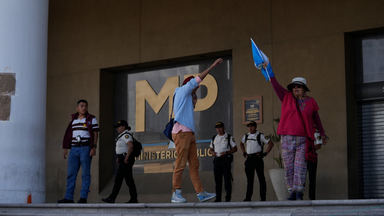 Demonstrators protest in front of Guatemala's Attorney General's office building in Guatemala City, Thursday, July 13, 2023. The Attorney General's Office announced on July 12 that a judge had suspended the legal status of the Seed Movement political party for alleged violations when it gathered the necessary signatures to form. The party's presidential candidate had been set to compete in a runoff election on Aug. 20. (AP Photo/Moises Castillo)