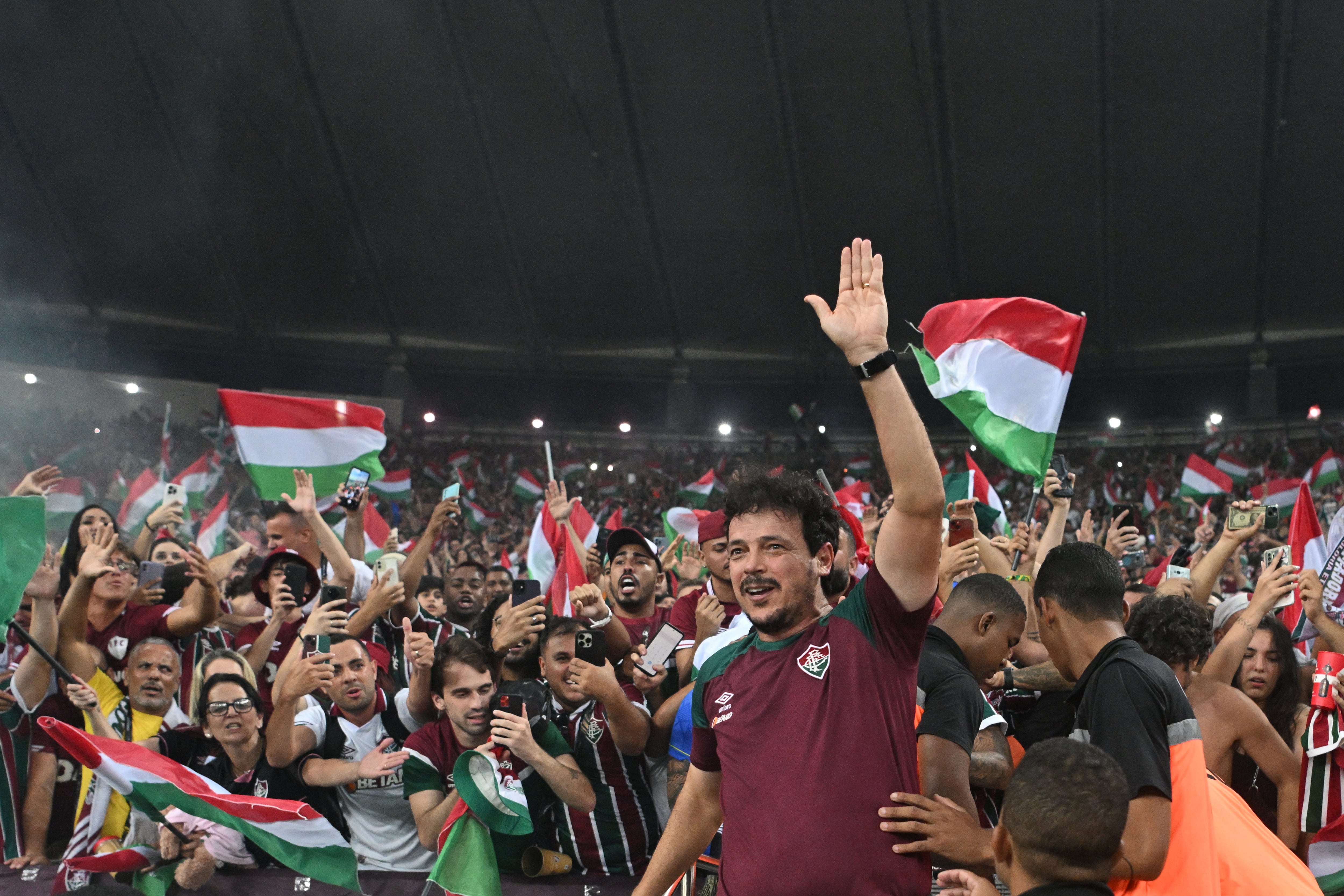 Fluminense's coach Fernando Diniz celebrates after winning the Copa Libertadores final football match between Brazil's Fluminense and Argentina's Boca Juniors at Maracana Stadium in Rio de Janeiro, Brazil, on November 4, 2023. (Photo by CARL DE SOUZA / AFP)