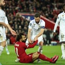 Soccer Football - Champions League - Round of 16 First Leg - Liverpool v Real Madrid - Anfield, Liverpool, Britain - February 21, 2023 Liverpool's Mohamed Salah and Real Madrid's Nacho REUTERS/Phil Noble