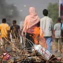 Pro-democracy protesters use fires to block streets to condemn a takeover by military officials in Khartoum, Sudan, Monday Oct. 25, 2021. Sudan’s military seized power Monday, dissolving the transitional government hours after troops arrested the acting prime minister and other officials. The takeover comes more than two years after protesters forced the ouster of longtime autocrat Omar al-Bashir and just weeks before the military was expected to hand the leadership of the council that runs the African country over to civilians. (AP Photo/Ashraf Idris)