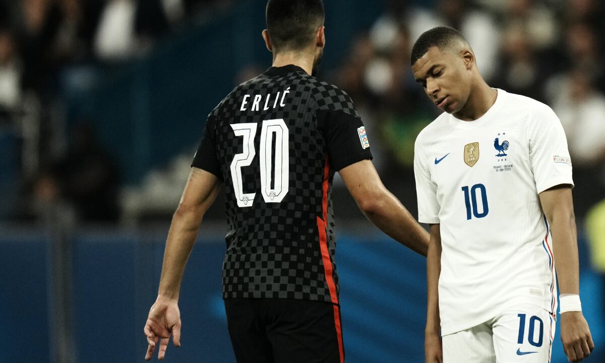 France's Kylian Mbappe, right, reacts during the UEFA Nations League soccer match between France and Croatia at the Stade de France in Saint Denis near Paris, Monday, June 13, 2022. (AP/Thibault Camus)