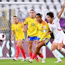 LODZ, POLAND - SEPTEMBER 13: Juana Ortegon of Colombia passes the ball whilst under pressure from Yon A Choe of DPR Korea during the FIFA U-20 Women's World Cup Group Stage match between Colombia and Korea DPR at Stadion Miejski on September 13, 2026 in Lodz, Poland. (Photo by Mateusz Slodkowski - FIFA/FIFA via Getty Images)