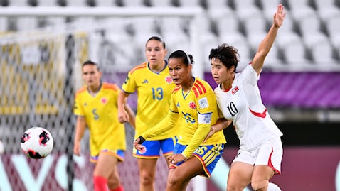 LODZ, POLAND - SEPTEMBER 13: Juana Ortegon of Colombia passes the ball whilst under pressure from Yon A Choe of DPR Korea during the FIFA U-20 Women's World Cup Group Stage match between Colombia and Korea DPR at Stadion Miejski on September 13, 2026 in Lodz, Poland. (Photo by Mateusz Slodkowski - FIFA/FIFA via Getty Images)