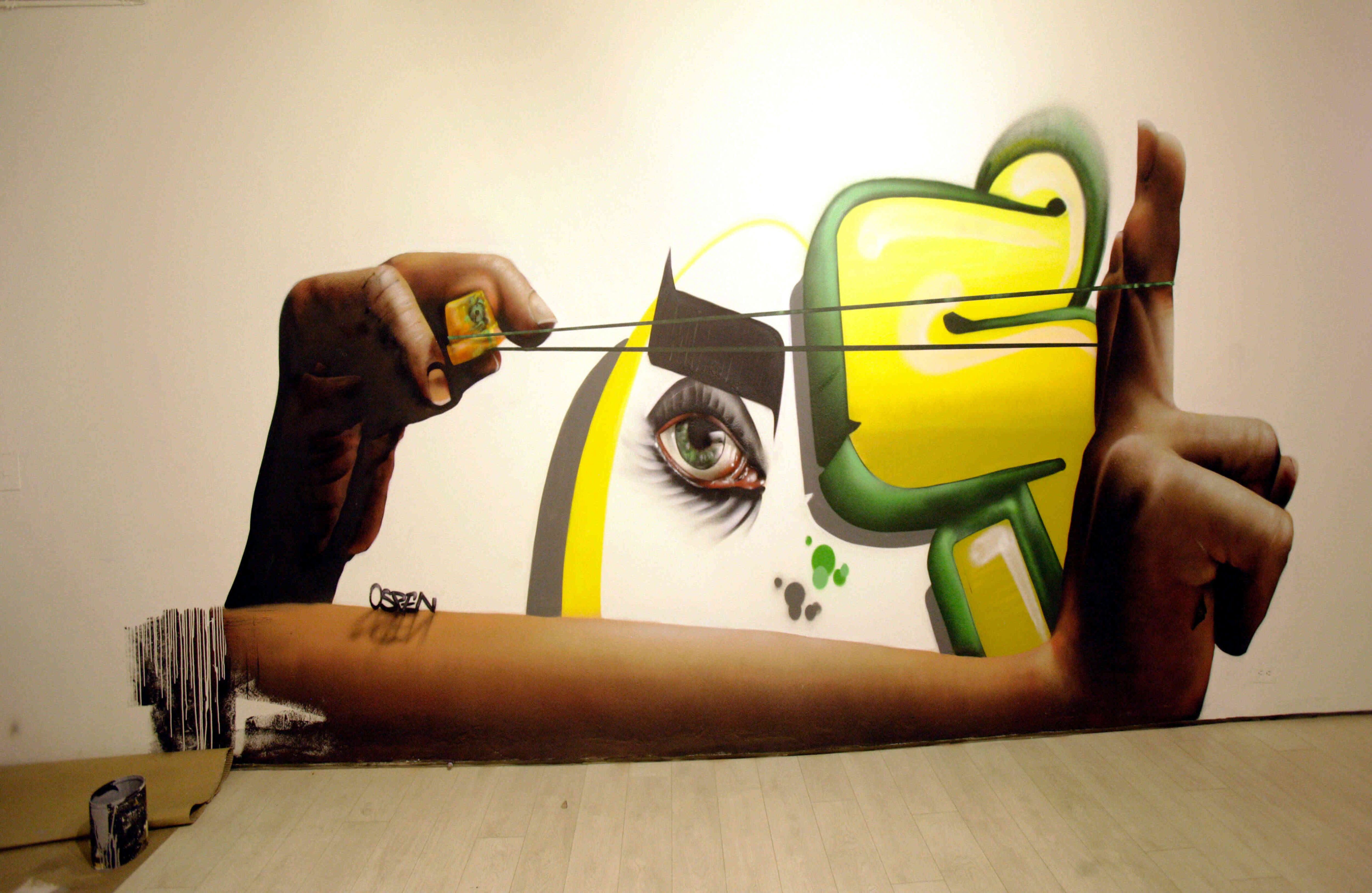 Graffiti de Ospen en la galería del Colombo Americano. Foto: Carlos Julio Martínez.