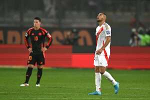 Peru's defender Alexander Callens (R) celebrates after scoring during the 2026 FIFA World Cup South American qualifiers football match between Peru and Colombia, at the Monumental stadium in Lima, on September 6, 2024. (Photo by ERNESTO BENAVIDES / AFP)