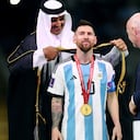 Soccer Football - FIFA World Cup Qatar 2022 - Final - Argentina v France - Lusail Stadium, Lusail, Qatar - December 18, 2022 Argentina's Lionel Messi, Emir of Qatar Sheikh Tamim bin Hamad Al Thani and FIFA president Gianni Infantino during the trophy ceremony REUTERS/Hannah Mckay