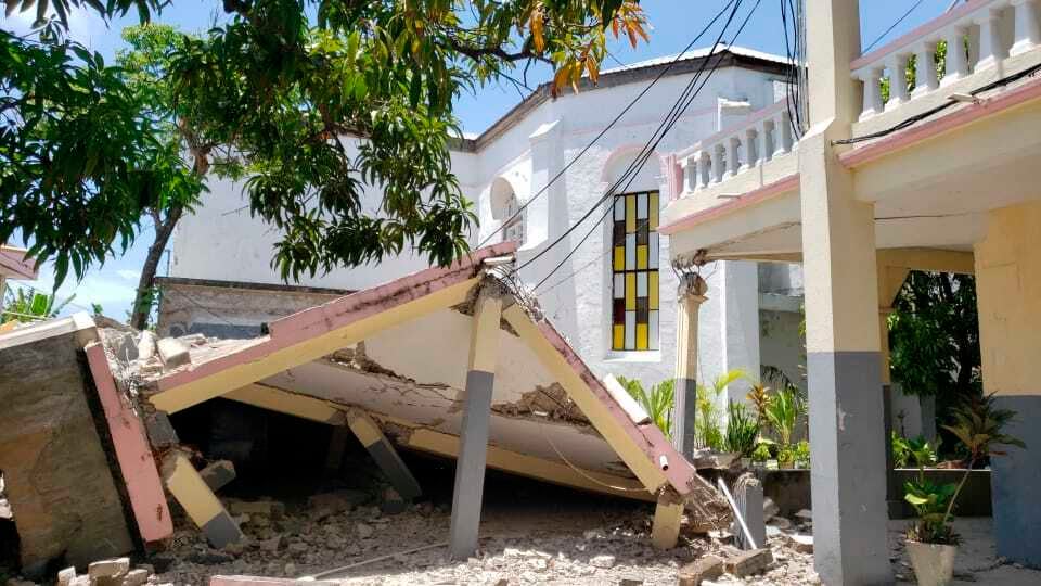 Sacred Heart church is damaged after an earthquake in Les Cayes, Haiti, Saturday, Aug. 14, 2021. (AP Photo/Delot Jean)