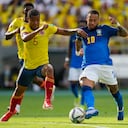 Brazil's Neymar, left, and Colombia's Wilmar Barrios battle for the ball during a qualifying soccer match for the FIFA World Cup Qatar 2022 in Barranquilla, Colombia, Sunday, Oct. 10, 2021. (AP Photo/Fernando Vergara)