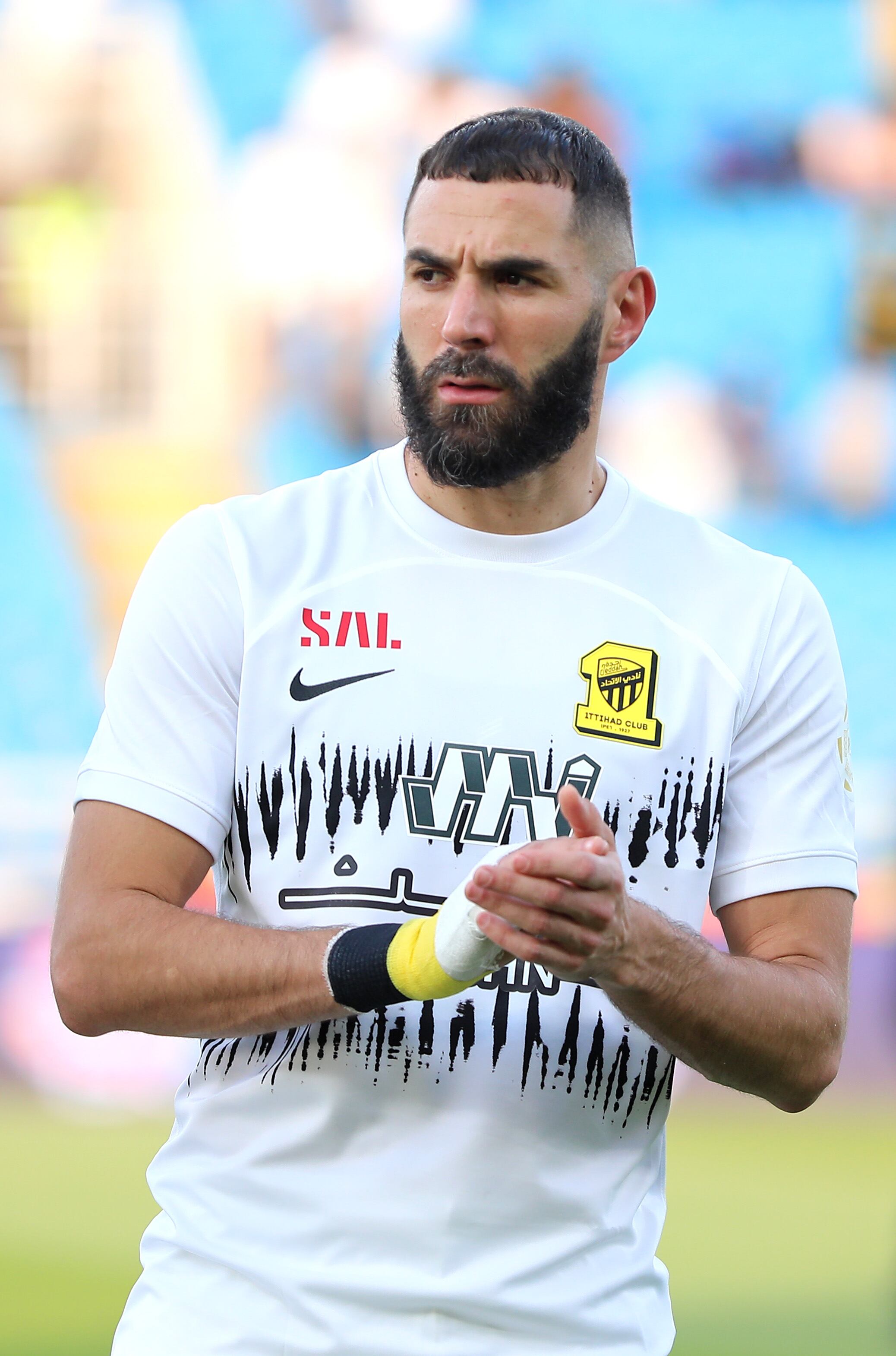 HAIL, SAUDI ARABIA - AUGUST 14: Karim Benzema of Al-Ittihad looks on prior to the Saudi Pro League match between Al Raed and Al-Ittihad at King Abdullah Bin Abdualziz Sport City on August 14, 2023 in Hail, Saudi Arabia. (Photo by Getty Images/Getty Images)
