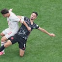 Morocco's Ayoub El Kaabi (20) and Canada's Stephen Eustaquio (7) fight for the ball during the World Cup round of 16 soccer match between Canada and Morocco in Houston, Saturday, July 4, 2026. (AP Photo/Eric Smith