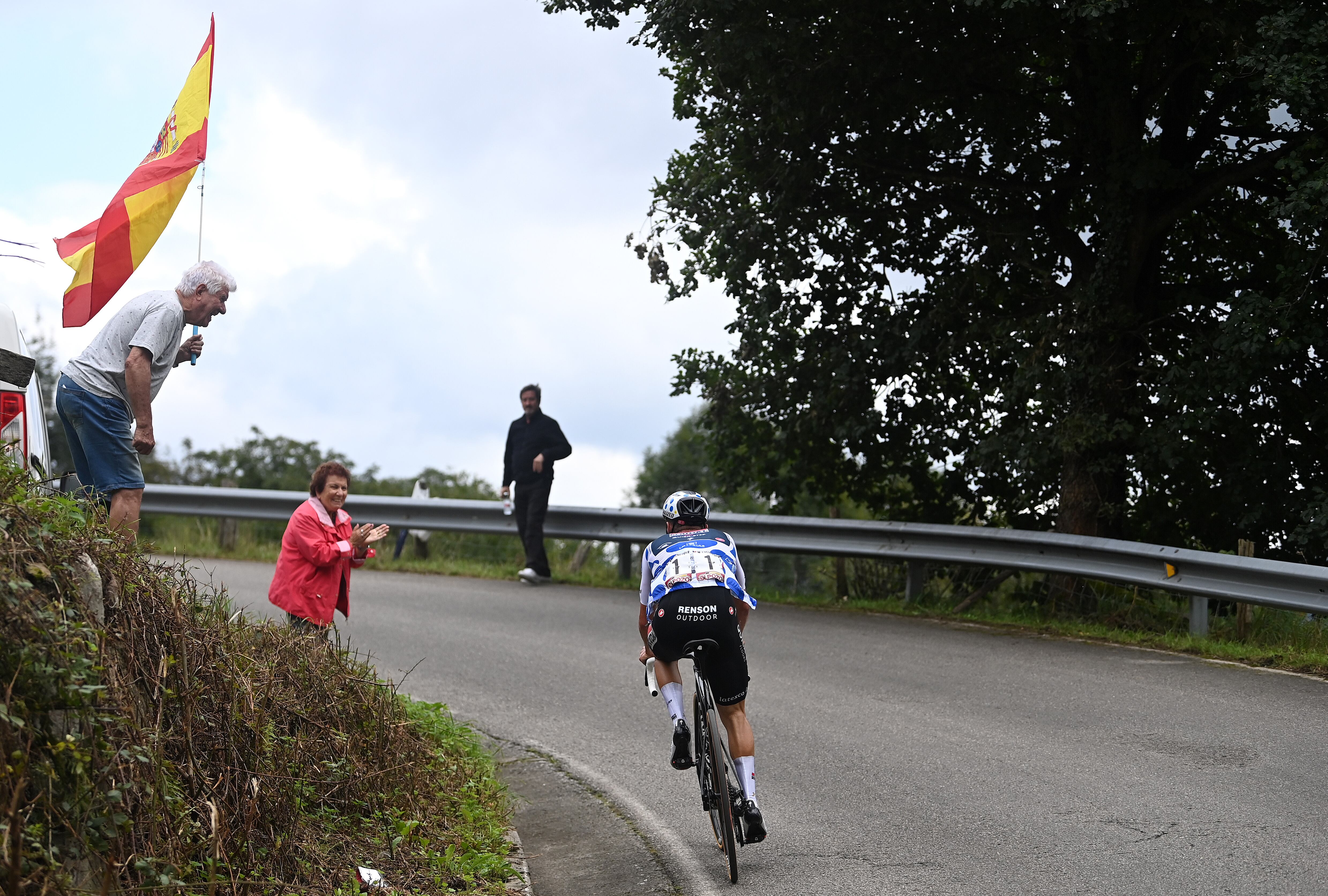 ALTU DE L'ANGLIRU, SPAIN - SEPTEMBER 13: Remco Evenepoel of Belgium and Team Soudal - Quick Step - Polka Dot Mountain Jersey competes in the breakaway during the 78th Tour of Spain 2023, Stage 17 a 124.4km stage from Ribadesella - Ribeseya to Altu de L'Angliru 1555m / #UCIWT / on September 13, 2023 in Altu de L'Angliru, Spain. (Photo by Tim de Waele/Getty Images)