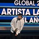 CORAL GABLES, FLORIDA - OCTOBER 05: Bad Bunny accepts an award onstage during the 2023 Billboard Latin Music Awards at Watsco Center on October 05, 2023 in Coral Gables, Florida. (Photo by Jason Koerner/Getty Images)