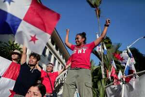 People celebrate the Supreme Court's ruling on the contract with Canadian mining company First Quantum and its subsidiary Minera Panama in Panama City on November 28, 2023. Panama's Supreme Court on Tuesday declared "unconstitutional" the concession contract for the largest copper mine in Central America, whose approval by Congress sparked protests that have had the country at a standstill for more than a month. (Photo by Roberto CISNEROS / AFP)